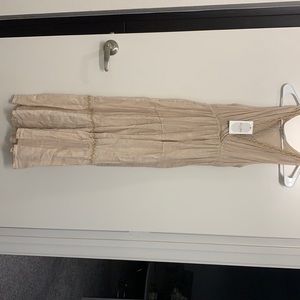 Long cream dress brand new.